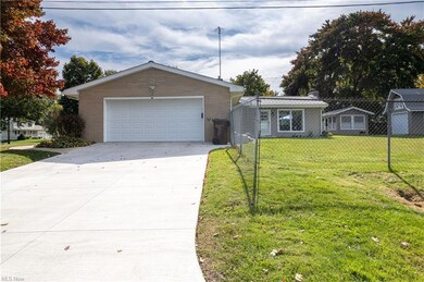 2 car attached garage and new concrete driveway