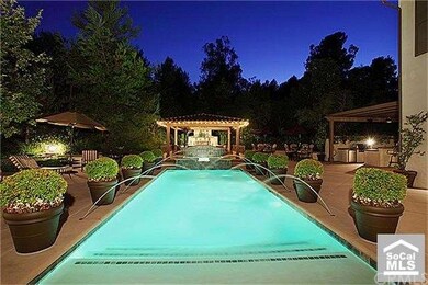 Pool, Gazebo with fireplace and water features