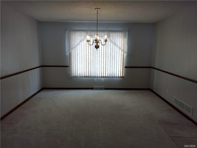 The dining room is right off the kitchen which hel
