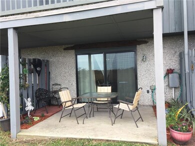 Covered patio with privacy fences