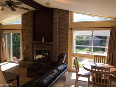 EAT IN AREA IN FAMILY ROOM. PICTURE WINDOW AND SLI