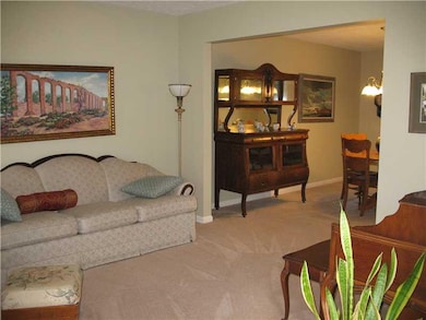 Living Room. Wonderful Formal living room is perfect for entertaining or just to lounge around.