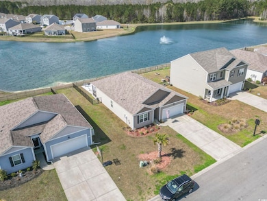 Bird's eye view with a residential view and a wate