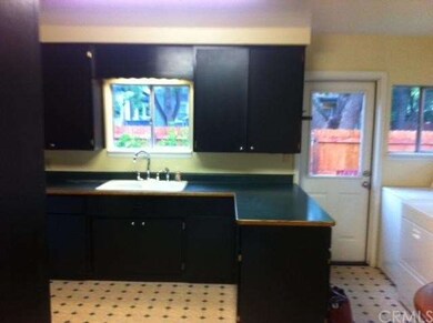 Kitchen opens to side and backyards