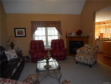 Another view of family room showing gas FP and win