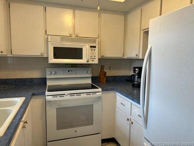 PASS THROUGH TO DINING ROOM AREA.  BOTTOM FREEZER.