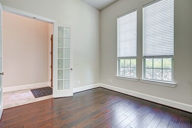 Enclosed by French doors, this marvelous study will easily accommodate your large office furniture.