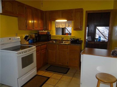 Kitchen. Convenient for kitchen duties..leads to d