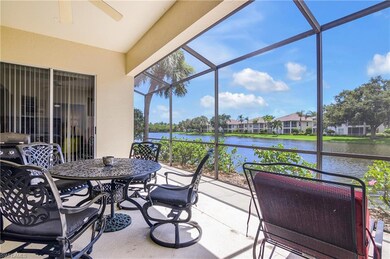 Sunroom / solarium featuring a water view, a ceili