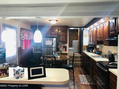 Kitchen on right side of home