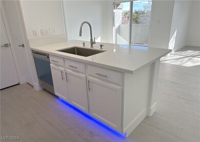 Lighting under cabinet on a sensor