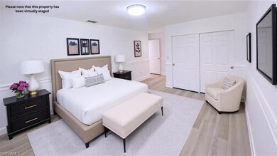 Bedroom featuring light wood-style flooring and a closet