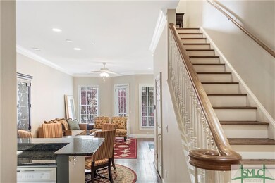 Downstairs has great open plan, half-bath and entr