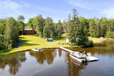 Property view of water featuring a dock