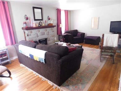 Living room showing the refinished hardwood floors