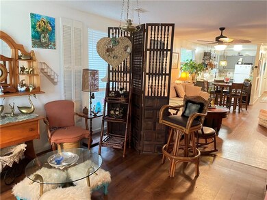 Open floor plan with screen used to separate area