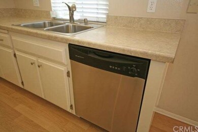 Close up of newer stainless steel dishwasher