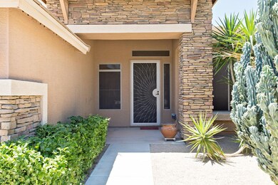 Gorgeous front door and porch.