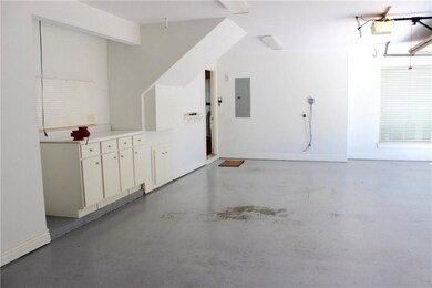 Workbench with built-in pegboard, vice, and storage space for tools.