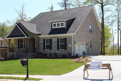 Side Entry Garage with Turn-Around Pad.