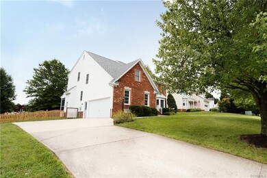 Paved driveway to 2-car garage entrance