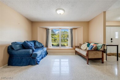 Living room with a textured ceiling