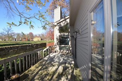 Private rear deck in shade of a Sweetbay magnola tree... walk patio door from Dining room...