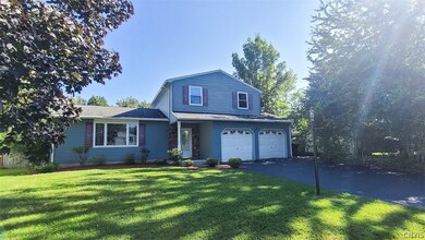 You'll also enjoy a spacious 2-car garage with a w