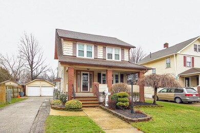 Beautifully landscaped front yard and spacious por
