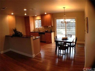 Functional kitchen and dining area with can lighti