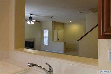 Kitchen looking into living room
