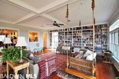 Greatroom with view of built-in library