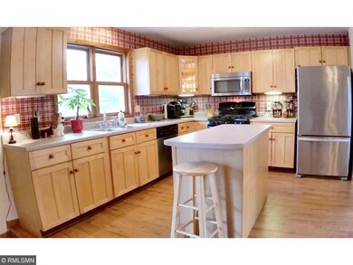 Newer 5 Burner gas stove & SS Frig