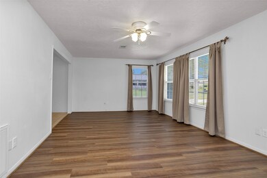 Huge Living room with New composite wood flooring.