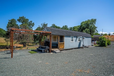 Cute outbuilding to store supplies while building.
