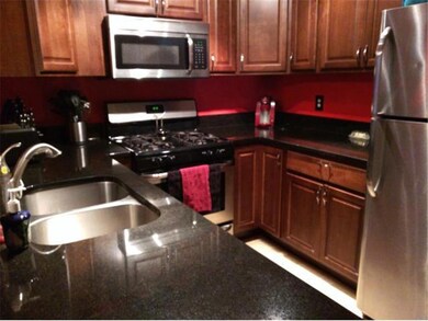 Notice the newer stainless steel appliances.