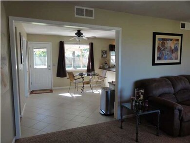 Large open design into dining room.