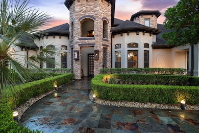 A grand stone turret and arched façade introduce t