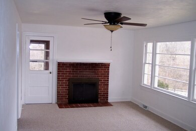 Living Room w/brick fireplace