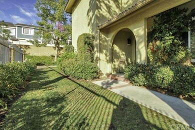 View of front entry, pool is to the left