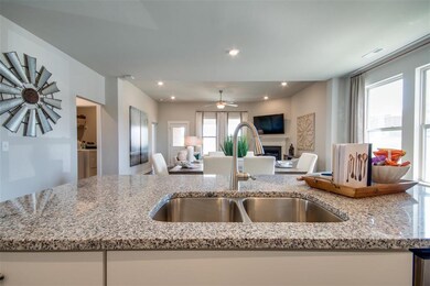 Moen faucet and granite included