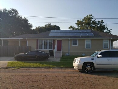 Side view of home with separate kitchen area entra