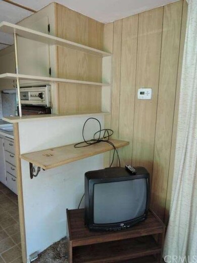 LIVING ROOM WITH TV/SHELVING