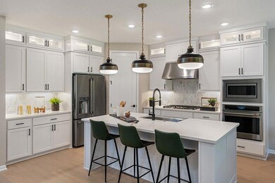 Kitchen with appliances with stainless steel fini