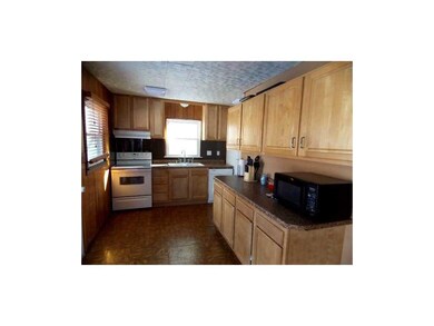 Kitchen. Extra counter space comes in handy in the