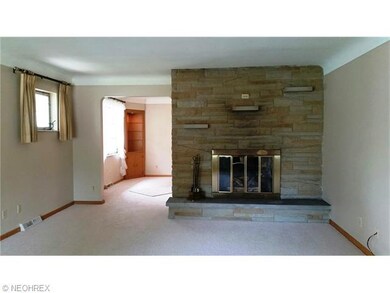 Beautiful new carpet (over hardwood) stacked stone Fireplace in LR, open to DR with built-ins! Cove ceilings!