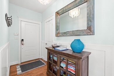 A NEW elevator brings you to this gracious top flo