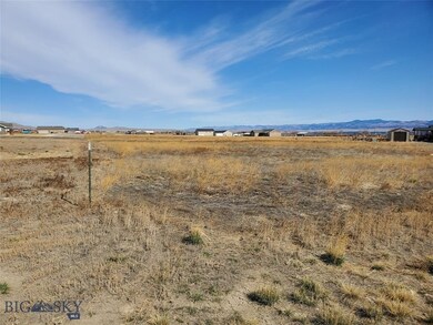 Looking down western lot line towards the NW