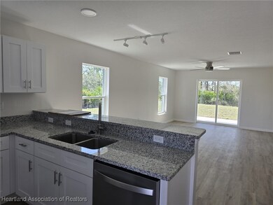 6922 San Benito Dr, Sebring, FL 33872 - photo 2