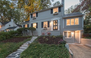 Front driveway with rear drive as well.